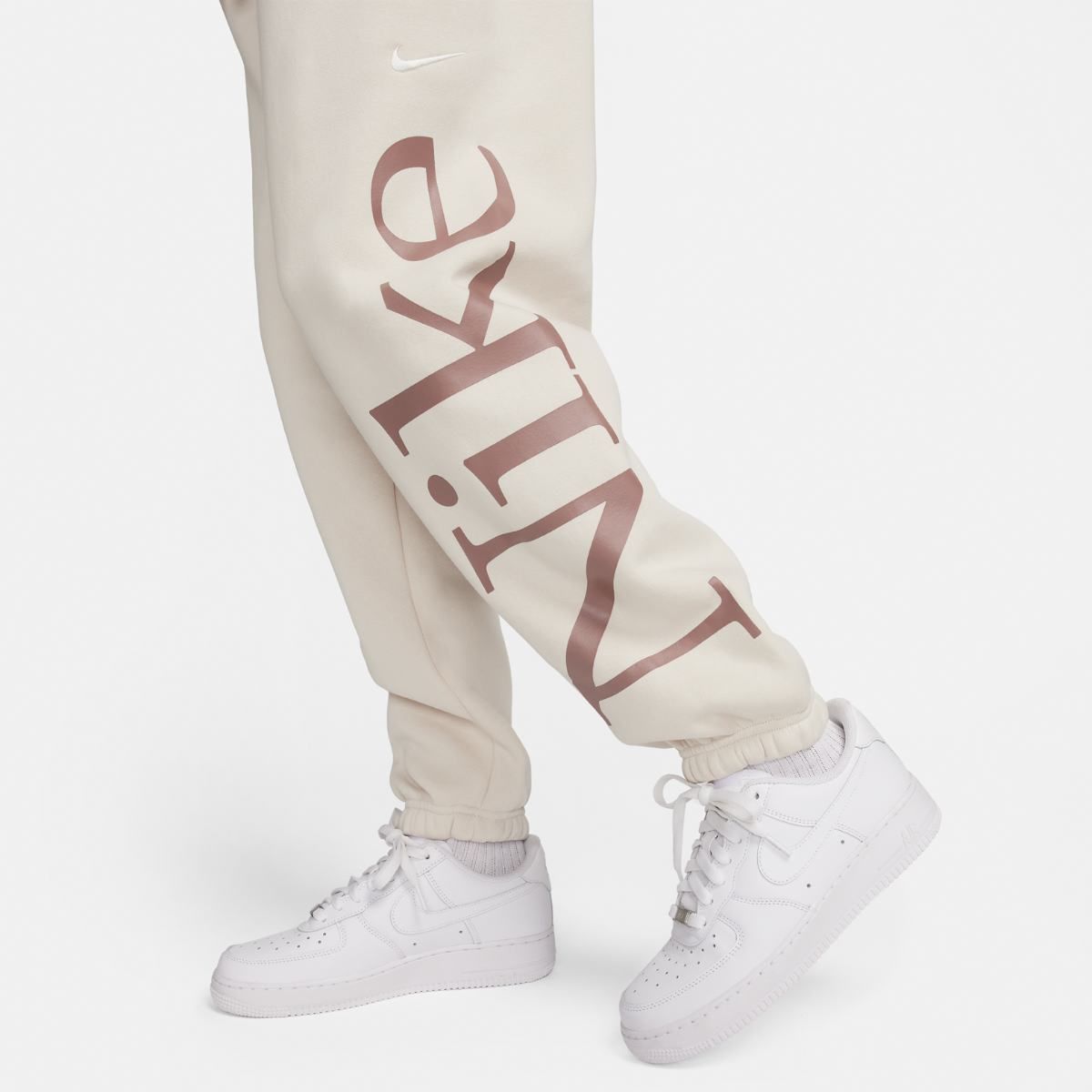 Штани жіночі Nike W Nsw Phnx Flc Os (FN2552-104) купити