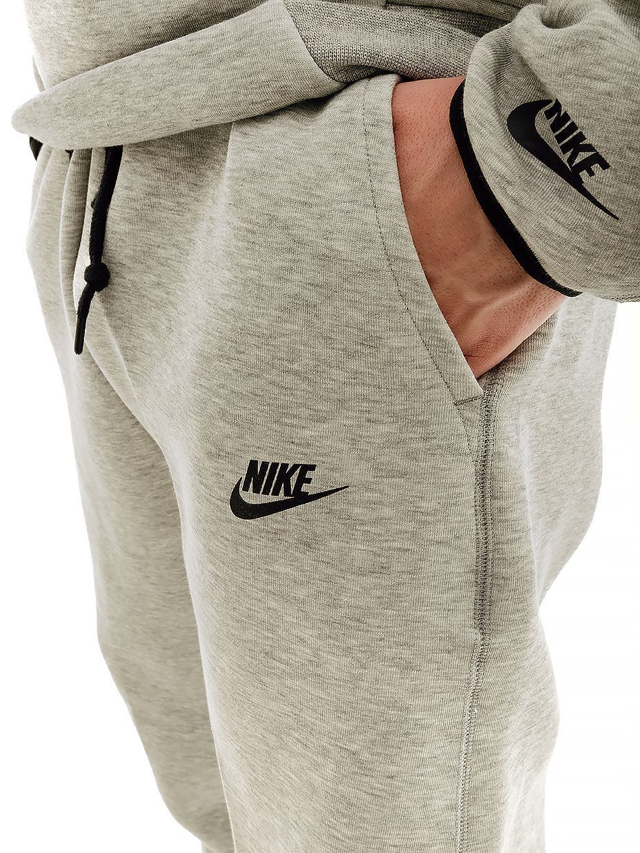 Штани Nike TCH FLC JGGR купити