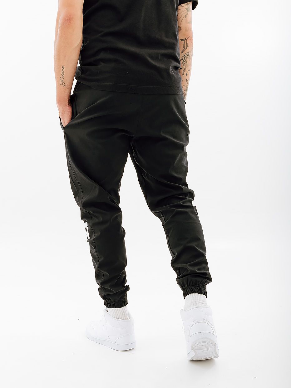 Штани Nike M NK DNA WOVEN PANT SSNL купити