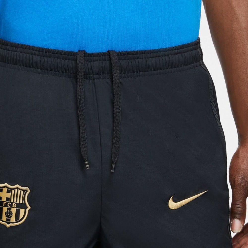 Штани Nike F.C. Barcelona Men's Woven Football Tracksuit Bottoms купити