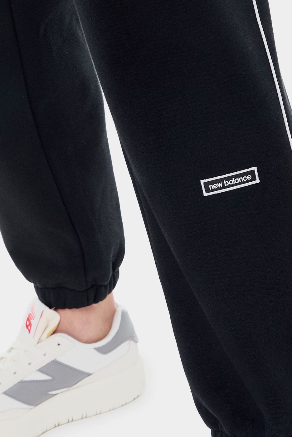 Штани New Balance ESSENTIALS BRUSHED купить