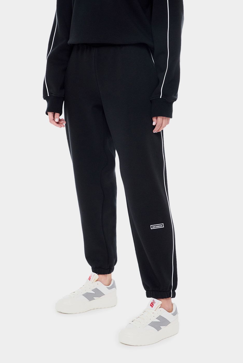 Штани New Balance ESSENTIALS BRUSHED купить