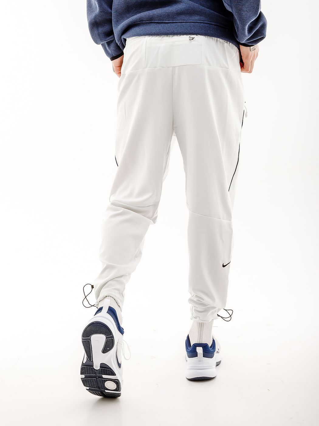 Штани Nike TRACK CLUB PANT купити