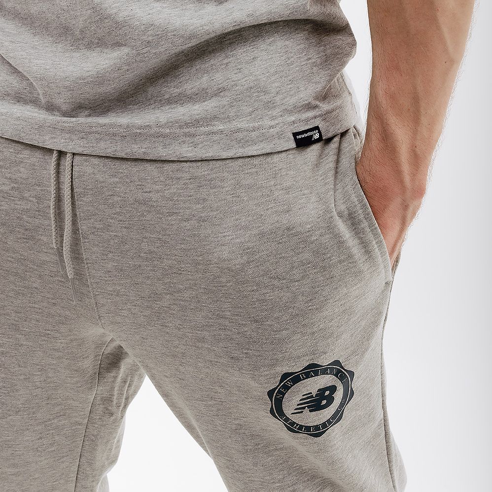 Штани New Balance Sport Seasonal купити