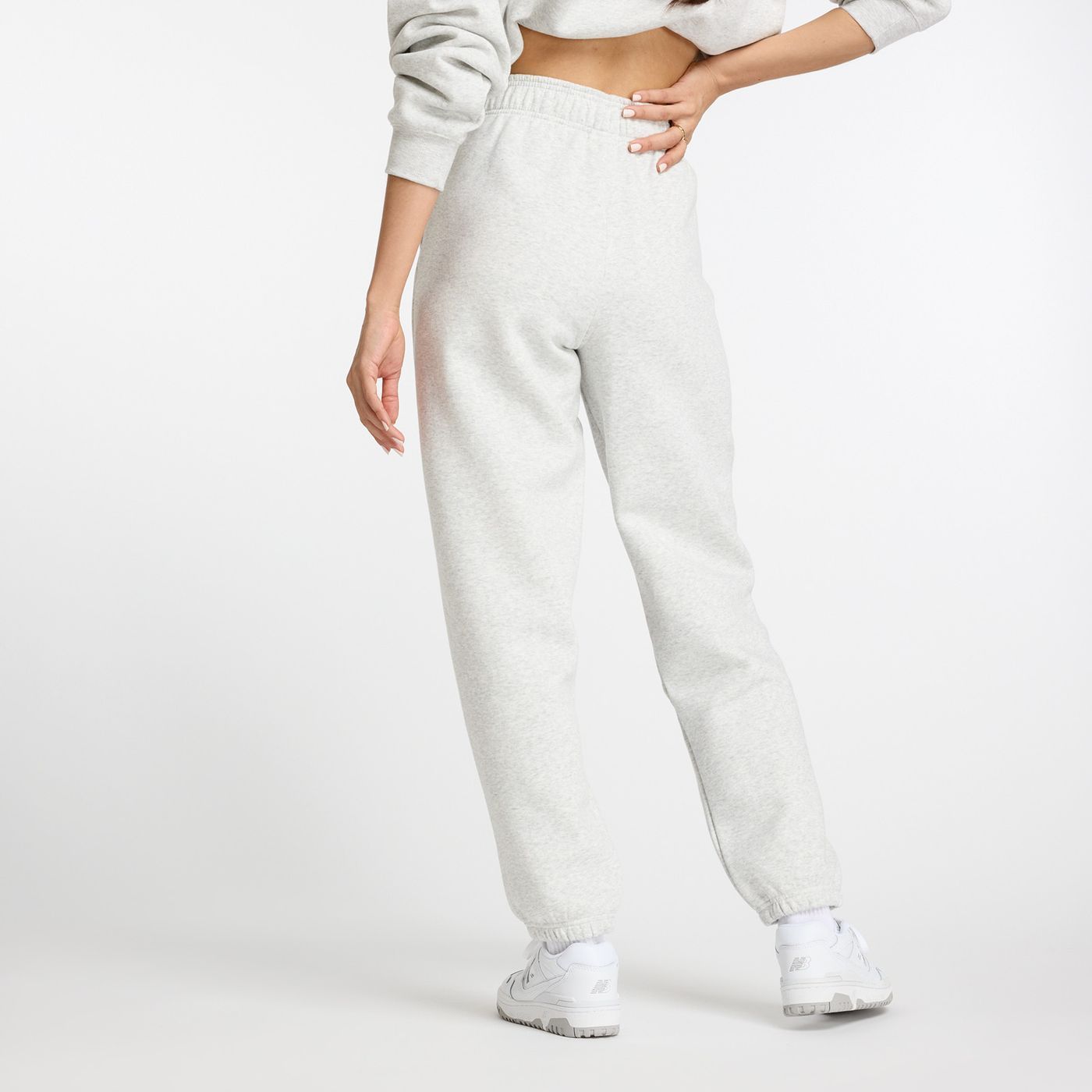 Штани спортивні New Balance ESSENTIALS FLEECE купити