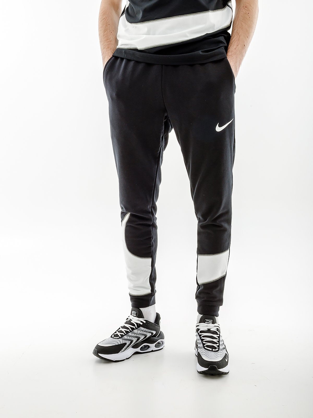 Штани Nike DF FLC PANT TAPER ENERG купити