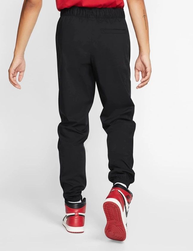 Штани JORDAN NFS M JUMPMAN LOGO FLC PANT купить